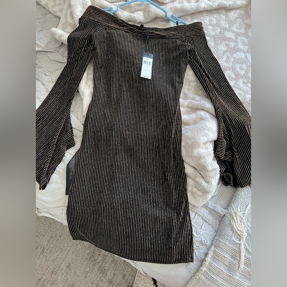BCBG maxazria black with gold stripe off the shoulder mini dress size S w/ tags